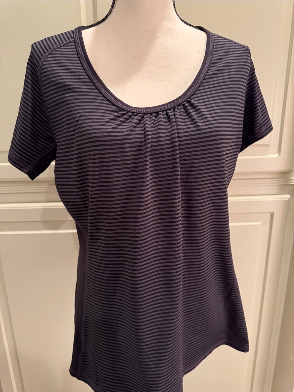 The North Face black and Charcoal Striped Scoop Neck Short Sleeve Top